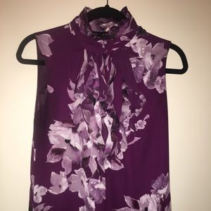 Purple White House Black Market shirt.